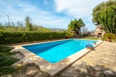 Large garden with swimming pool and Mallorcan-style barbecue