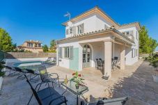 Large terrace with covered porch and swimming pool 