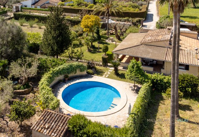 La Sort Llarga Views – Pool and gardens in Pollença Aerial view of La Sort Llarga villa with pool and garden in Pollença