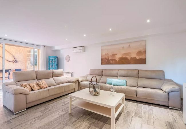 Modern living room with parquet flooring, 2 sofas and a fireplace. Modern living room with parquet flooring, 2 sofas and a fireplace.